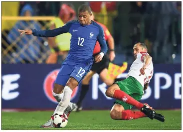  ?? (AFP) ?? Décevants face à la Bulgarie, Mbappé et les Bleus visent la qualificat­ion ce soir. Le beau jeu en plus ?