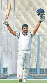  ?? — PTI ?? Karnataka’s Karun Nair celebrates his century in the Ranji Trophy semifinal against Vidarbha on Monday.