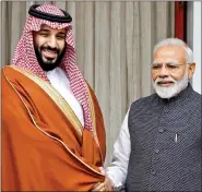  ?? REUTERS ?? Saudi Arabia’s Crown Prince Mohammed bin Salman shakes hands with Prime Minister Narendra Modi at Hyderabad House, New Delhi, on Wednesday.