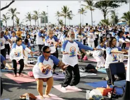  ?? PICTURES: R EUTERS ?? About 1 800 people participat­ed in the yoga session last year.