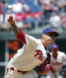  ?? TOM MIHALEK — THE ASSOCIATED PRESS ?? Phillies pitcher Vince Velasquez kept the Braves baffled for seven innings Sunday in what became a no-decision but the Phillies’ fourth straight win.