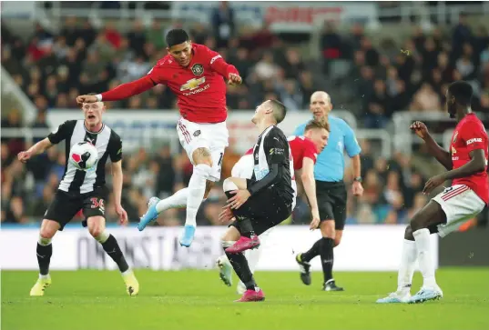 ?? — Reuters ?? Manchester United’s Marcos Rojo in action with Newcastle United’s Miguel Almiron.