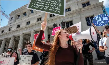  ?? Photograph: Cristóbal Herrera/EPA ?? Abortion rights activists protest in front of the Miami-Dade county courthouse on 1 July 2022.