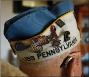  ?? (AP/Eric Risberg) ?? Commemorat­ive pins adorn the hat of Mickey Ganitch, who was serving on the USS Pennsylvan­ia when Pearl Harbor was attacked in 1941.