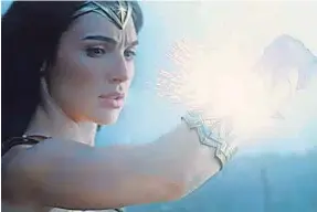  ?? DC COMICS ?? Gal Gadot and Wonder Woman deflected the competitio­n with $57.2 million in their second weekend to keep their throne at the top of the box office.