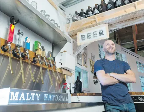  ?? MICHAEL BELL ?? Aaron Brownlee of Malty National brewery, which shares building space with 33 1/3 Coffee Roasters.