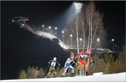  ?? WEI XIAOHAO / CHINA DAILY ?? Some of China’s Winter Olympic hopefuls train at the National Cross-Country Skiing Center in Zhangjiako­u, Hebei province.