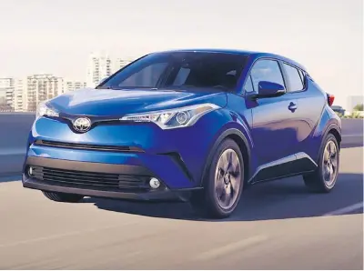  ??  ?? The 2018 Toyota C-HR is a four-door, five-seat cute-utility vehicle, described as either a compact or subcompact SUV.