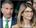  ??  ?? Mossimo Giannulli and Lori Loughlin