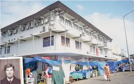  ??  ?? A shopping area in Nabua, Suva where the Kings Hotel was previously located. INSET: Bob Amos.