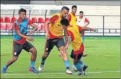  ?? AIFF ?? Robin Singh (centre) tackles during practice.