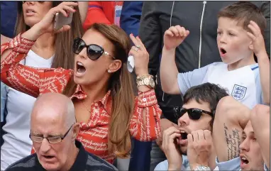  ??  ?? Drama: Coleen with her son Kai at the match in which England came from behind to win