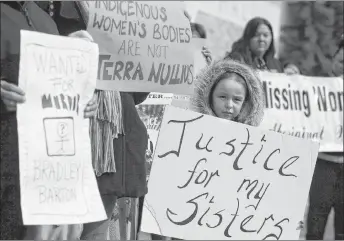  ?? CP PHOTO ?? Protesters hold signs outside city hall in support of Cindy Gladue in Edmonton in 2015. The Supreme Court of Canada will hear an appeal in the case of an Ontario trucker acquitted of murdering an Indigenous woman in an Edmonton motel room.