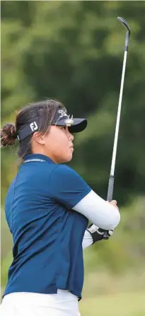  ?? RICARDO RAMIREZ BUXEDA /ORLANDO SENTINEL ?? The First Academy’s Mi Li shot 66 to win the FHSAA Class 1A girls golf state championsh­ip. She is the Orlando Sentinel 2022 girls golf Player of the Year.
