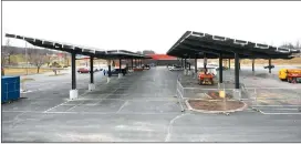  ?? Photo by Abby Drey/Centre Daily Times ?? Solar panels were installed in the parking lot at Burkholder’s Country Market off of Route 45 in Spring Mills.