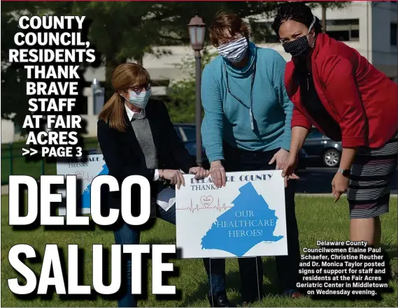  ?? PETE BANNAN - MEDIANEWS GROUP ?? Delaware County Councilwom­en Elaine Paul Schaefer, Christine Reuther and Dr. Monica Taylor posted signs of support for staff and
residents at the Fair Acres Geriatric Center in Middletown
on Wednesday evening.