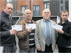  ??  ?? Eviction orders: Ryan Mowat, Alan McCarthy and Grigor Jeus with notices and Cllr John Gilligan