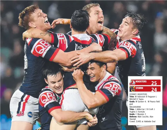  ?? Picture: GETTY ?? Mitchell Pearce of the Roosters celebrates with his teammates after kicking the winning field goal during the round 16 NRL match bagainst he Melbourne Storm at Adelaide Oval last night