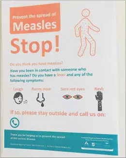  ?? PICTURE / NZ HERALD ?? A measles informatio­n poster at Greenlane Clinical Centre in Auckland.