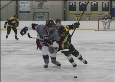  ?? JENNIFER FORBUS — FOR THE MORNING JOURNAL ?? Amherst’s Logan Eicher puts his body into defense against Rocky River’s Zach Pejean.