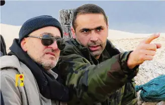  ?? Hezbollah Military Media/Associated Press ?? Senior Hezbollah commander Wissam Tawil, right, who was killed in Kherbet Selem village, south Lebanon, on Monday, and slain Hezbollah top commander Mustafa Badreddine, who was killed in Syria on May 2016.