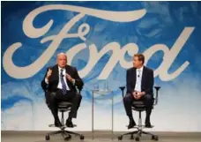  ?? PAUL SANCYA/THE ASSOCIATED PRESS FILE PHOTO ?? Ford’s CEO Jim Hackett, left, says the automaker is going to be “quicker and more purposeful” in its decisions.