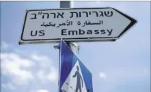  ?? Amit Sha’al The Associated Press ?? A sign notes the U.S. Embassy in Jerusalem. Part of the U.S. Consulate building on Monday will become the embassy, which currently is in Tel Aviv.