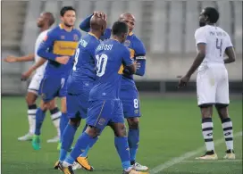  ?? Picture: BHEKI RADEBE ?? CITY SMILES: Lebogang Manyama celebrates Ayanda Patosi ‘s goal with Letsie Koapeng at Cape Town Stadium last night.