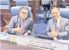  ?? ?? Ellron (left) with Karambunai assemblyma­n Datuk Yakubah Khan at the State Assembly yesterday.