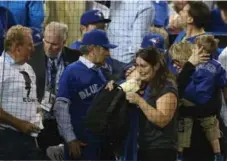  ?? STEVE RUSSELL/TORONTO STAR ?? Spray from a beer can reportedly hit a baby during the seventh inning of Wednesday’s Jays-Rangers game. The child was not injured.