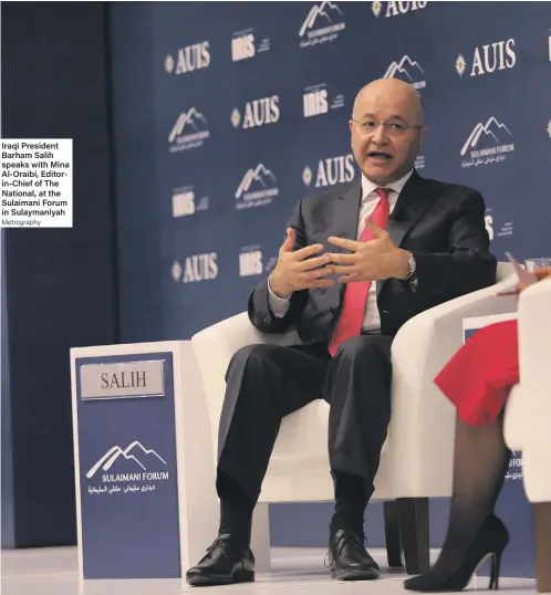  ??  ?? Iraqi President Barham Salih speaks with Mina Al-Oraibi, Editorin-Chief of The National, at the Sulaimani Forum in Sulaymaniy­ah Metrograph­y