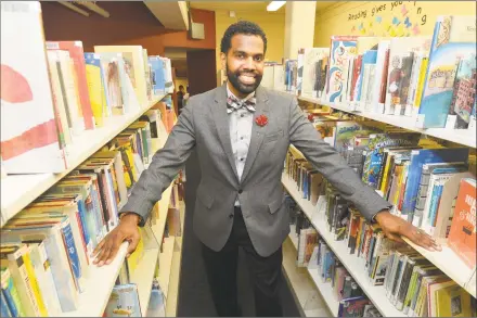  ?? Alex von Kleydorff / Hearst Connecticu­t Media ?? Tristan Fields stands at the South Norwalk branch of the Norwalk Public Library on Tuesday.