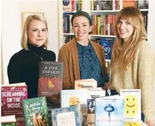  ?? STAFF PHOTO BY MATT HAMILTON ?? Standing for a photo at their North Chattanoog­a store are, fom left, The Book & Cover owners Emily Lilley, Blaes Green and Sarah Jackson.