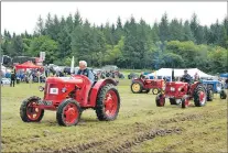  ?? 06_a33MAShow6­8 ?? An impressive parade of vintage tractors brings back memories for many around the ring.