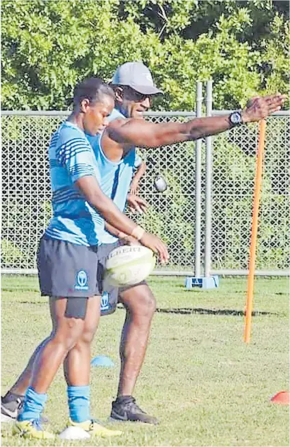  ?? Picture: FRU ?? Fijiana 7s assistant coach Timoci Volavola assists Raijieli Daveua during a training session.