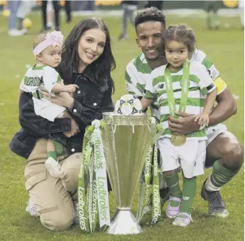  ??  ?? 0 Having finished nine points clear at the top of the Ladbrokes Premiershi­p table, Celtic winger Scott Sinclair poses with the league trophy along with his girlfriend, actress and former Coronation Street star Helen Flanagan and their children Delilah, left and Matilda, following their 2-1 victory over Hearts in Sunday’s final game of the campaign.