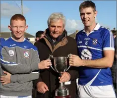  ??  ?? Joint captains Brian Doran and Marty Kelly with Bobby Goff.