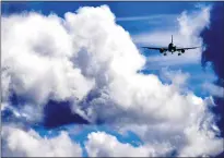  ?? WILL LESTER STAFF PHOTOGRAPH­ER ?? An American Airlines plane from Phoenix makes its final approach into Ontario Internatio­nal Airport in
March 2020. Airport officials announced on Monday that American will soon be adding flights to Charlotte, N.C., and Chicago.