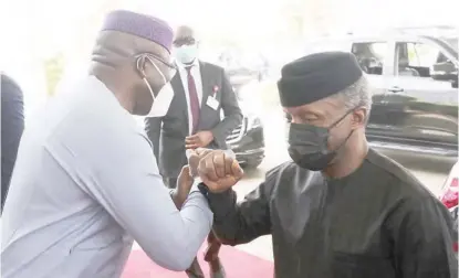  ??  ?? Vice President Yemi Osinbajo (r) being received by Kayode Fayemi, governor, Ekiti State/chairman, Nigeria Governors’ Forum, during the National Economic Council Meeting at the State House Conference Centre in Abuja, yesterday. NAN