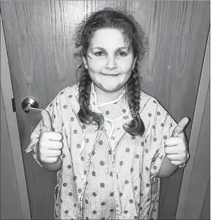  ?? SUBMITTED PHOTO ?? Skyla Bennett, 9, gives two thumbs up after getting positive results from her annual checkup at the Tumour Clinic.