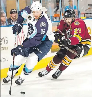  ?? MILWAUKEE ADMIRAL PHOTO ?? Bonavista’s Adam Pardy (6), shown playing for the AHL’S Milwaukee Admirals against the Chicago Wolves last season, is set to become an unrestrict­ed free agent for a fifth straight season.
