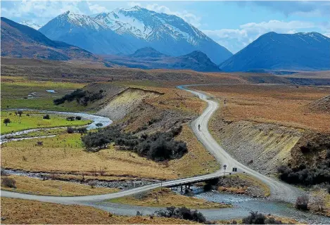  ?? GARY PATTERSON ?? Above, the Around the Mountains Trail in Southland takes riders into some of New Zealand's most remote rural settings; below, in as-yet-uncharted territory in Patagonia.