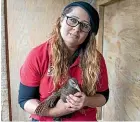  ?? HELEN NICKISSON/STUFF ?? Ecoworld manager Janelle White with Tita the weka.