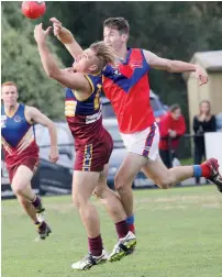  ??  ?? Buln Buln’s Harley Nobelius spoils Warragul Industrial­s player River Ford.