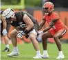  ?? AP ?? Michael Dunn (left) has re-signed with the Browns, the team announced Monday, along with Ben Stille and Thomas Graham Jr.