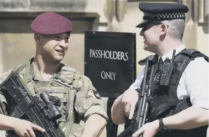  ??  ?? 0 Troops on British streets are a temporary measure - but will they become permanent, asks Bill Jamieson