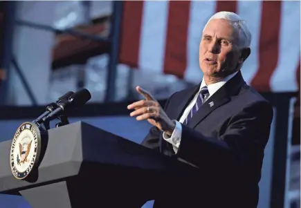  ?? PHOTOS BY RICK WOOD / MILWAUKEE JOURNAL SENTINEL ?? Vice President Mike Pence addresses attendees at the “USMCA: A Better Deal for American Workers” trade policy event Wednesday at Uline Warehouse in Pleasant Prairie,