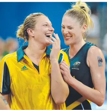  ??  ?? BIG GUNS: Close friends and former Australian Opal teammates Lauren Jackson and Suzy Batkovic sharing a laugh after a win over Belarus at the 2008 Olympic Games in Beijing.