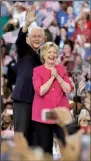  ?? AP/MATT SLOCUM ?? Hillary Clinton, with her husband, former President Bill Clinton, arrives Friday at Temple University in Philadelph­ia for her first campaign rally as the Democratic presidenti­al nominee.