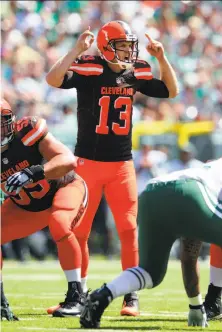  ?? Brad Penner / Associated Press ?? Josh McCown led the Browns down the field in the opener against the Jets before suffering a concussion at the goal line.